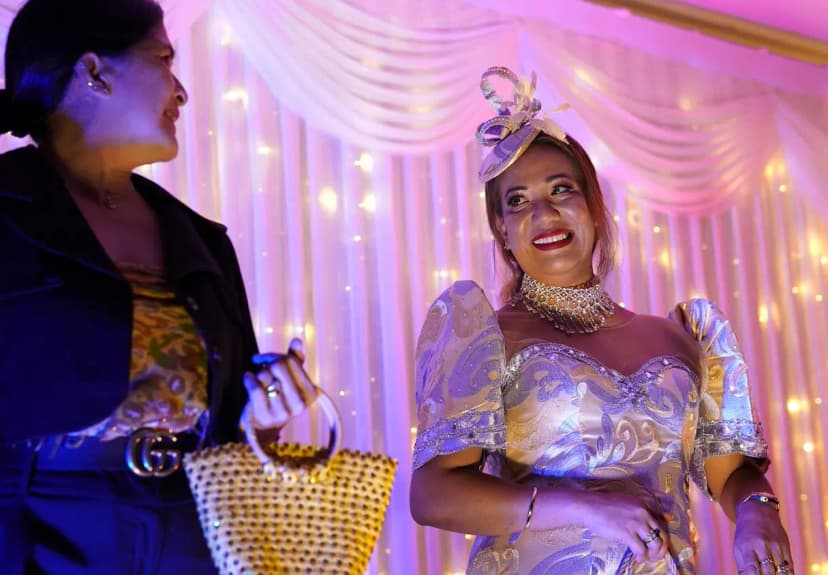 two women glamoured up at an OrbitRemit event